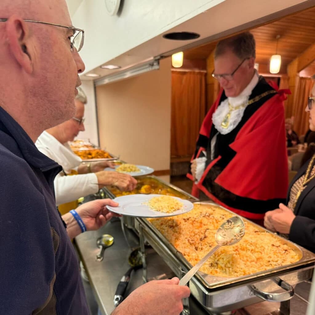 Sleep Out 2024 Mayor at the food counter