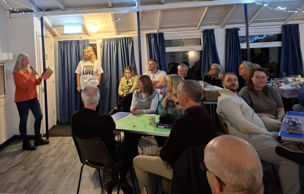 Angela speaking at our quiz night